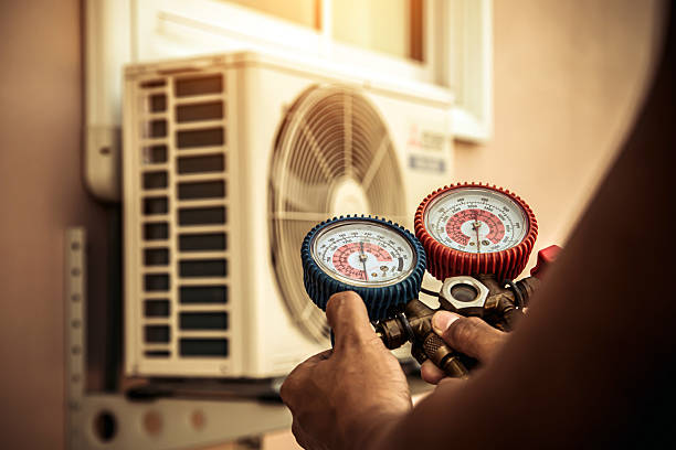Professional Air Conditioning Service technician working in Indian Hills, CO